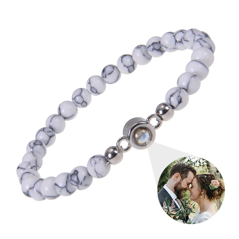 Personalised photo projection bracelet with picture inside the charm
